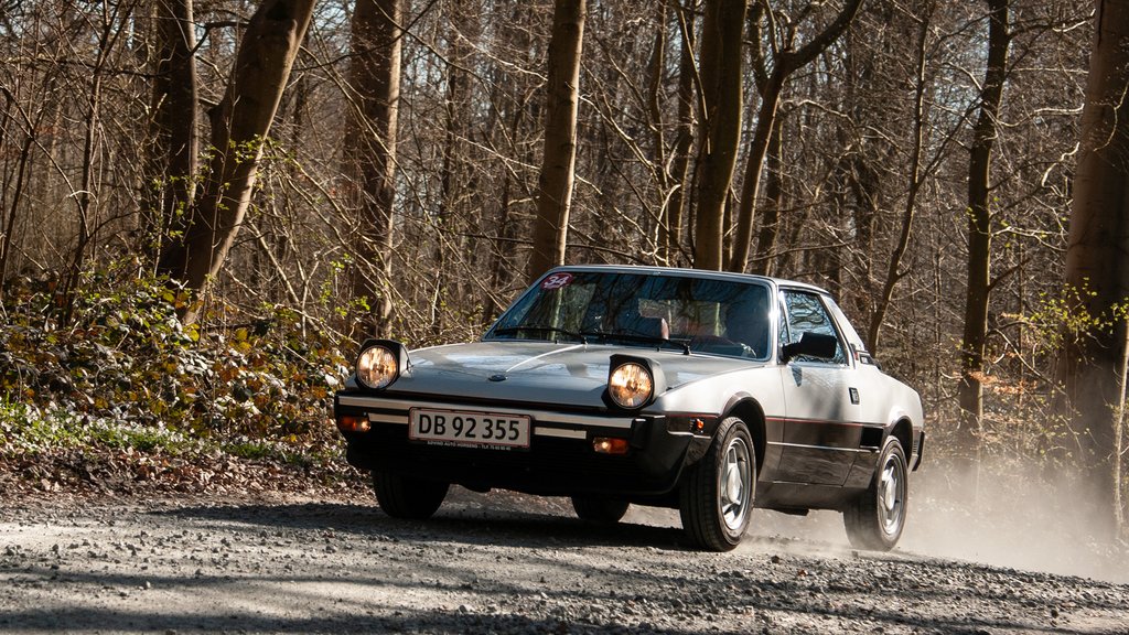 Fra Aarhus Automobil Sport deltager Torben Sørensen og Poul Erik Hansen i Touring-klassen, hvor de i en Fiat X 1/9 fra 1982 ligger placeret på en samlet 5. plads efter de to første afdelinger
(Foto: Viggo Johansen, rallypics.dk)
